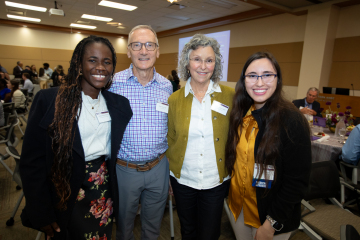 Students Selma Okyere-Badoo and name with philanthropists Dr. Mark and Suzanne Hess at the annual ECU Health Foundation Scholarship Luncheon at Eastern AHEC on Nov. 7, 2025.